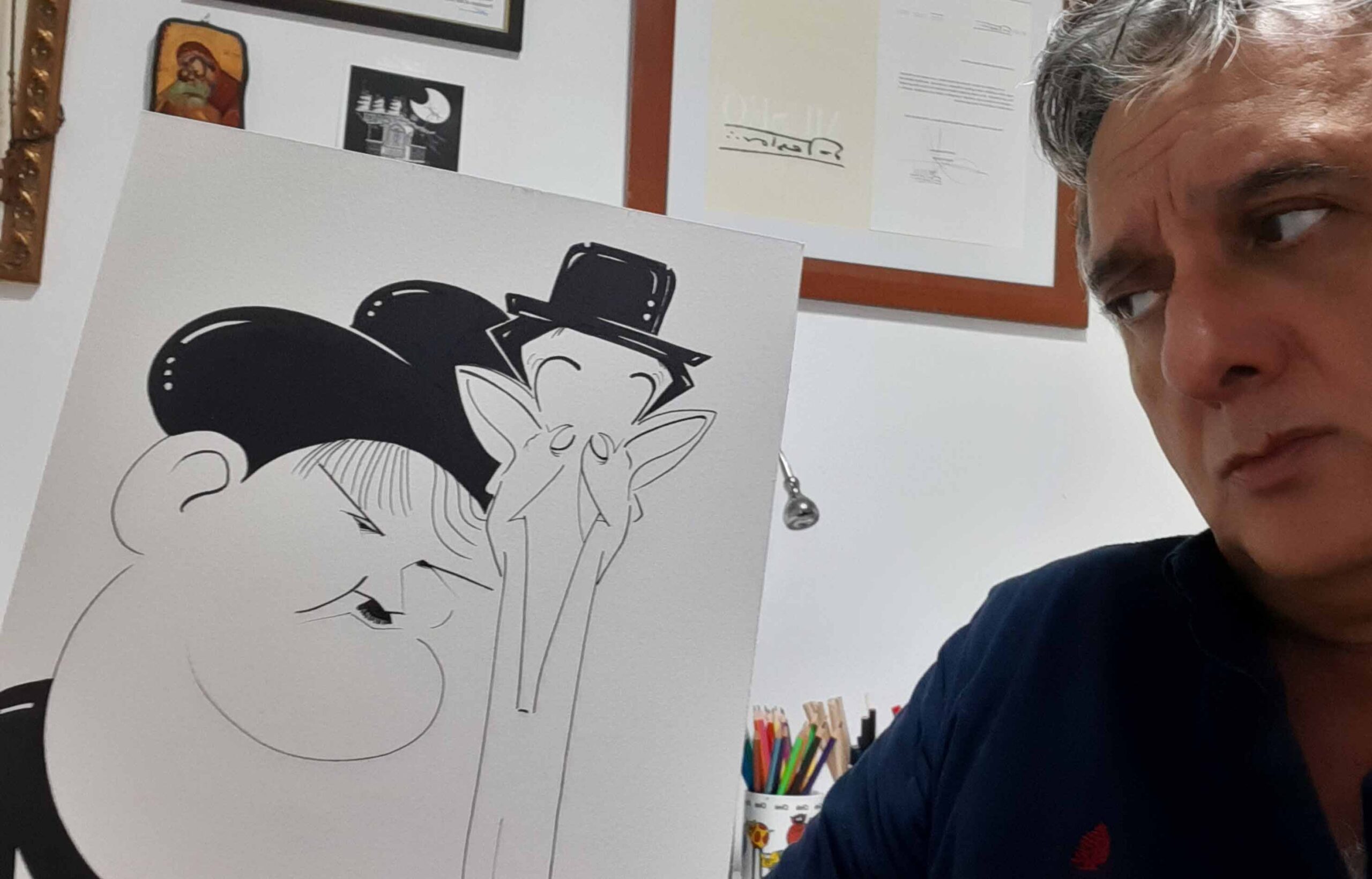 El caricaturista Néstor Dámaso y Benito Pérez Galdós se encuentran en un taller creativo